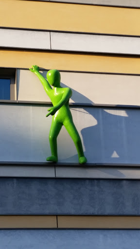 Green Man against the Building