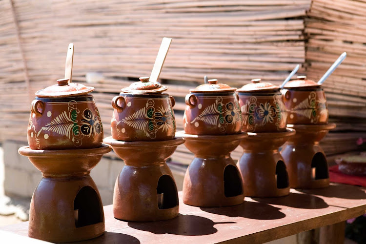Pots of enticing food in Cabo San Lucas, Mexico.
