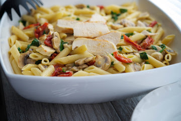 Penne with Grilled Chicken and Vegetables in a Lemon Butter White Wine Sauce