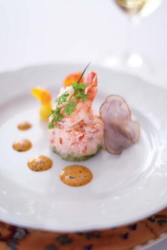 A lobster salad starts off an elegant meal aboard Crystal Symphony.