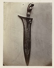 Kris (keris) ornamented with a veiled Durga, acting as the goddess of the netherworld, ready for frightening a victim to death; probably inscribed with a Koran verse in Arabic script. Garut, Garut disctrict, West Java province, 18th century.