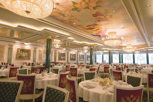 Norwegian-Pearl-Dining-Palace - Russian-inspired furniture, beautiful ceiling paintings and five-course meals welcome guests at the Summer Palace restaurant board Norwegian Pearl. 