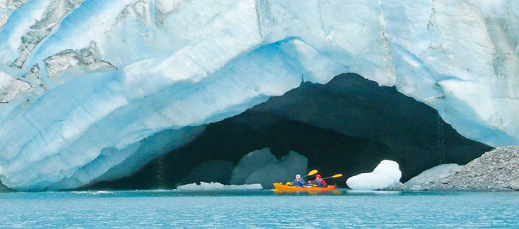 Kayak through the icy blue seas of Alaska, one of the activities offered on your Princess cruise. 