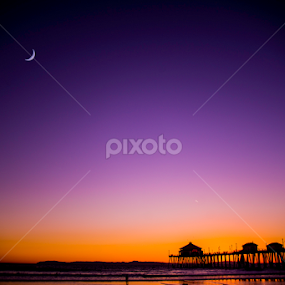 Moon at Huntington Beach Pier at sunset by Robie Blair - Landscapes Beaches
