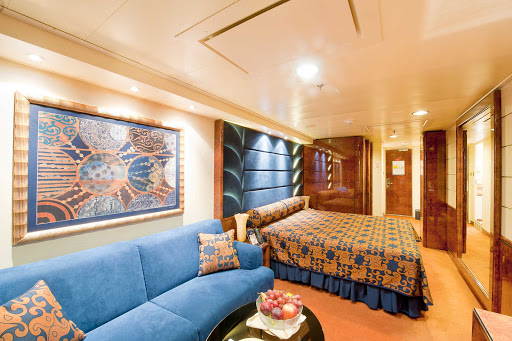 MSC-Splendida-Deluxe-Suite - Wrapped in the blues and golds of the Mediterranean landscape, MSC Splendida's Deluxe Suites offer Yacht Club guests ample space and impeccable butler service. 
 