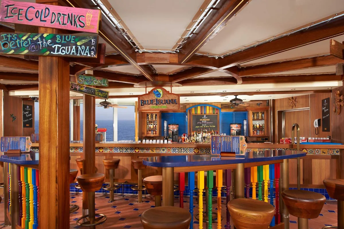Carnival-Breeze-Blue-Iguana-Bar - Relax with a drink in the Blue Iguana Bar when you sail on Carnival Breeze. 