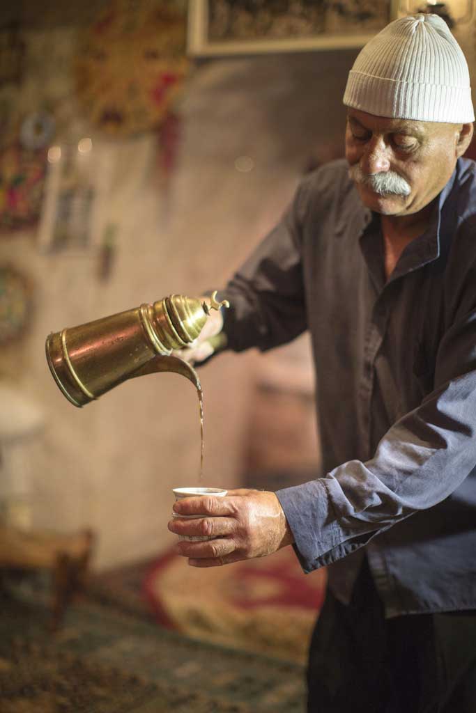 A Druze man pours coffee in Northern Israel.