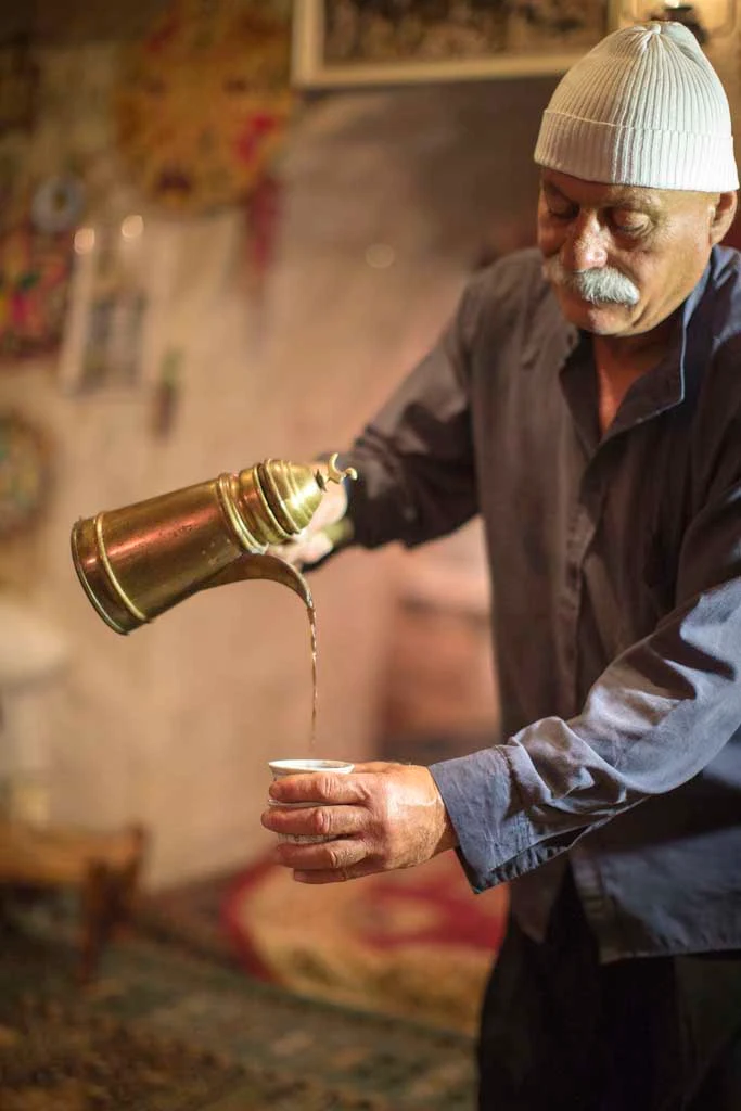 druze-man-coffee-Israel - A Druze man pours coffee in Northern Israel.