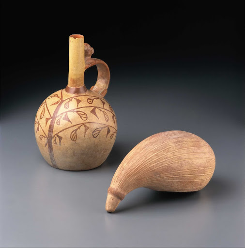 Sculptural ceramic ceremonial vessel that represents the fruit of the ulluchu (right) ML006495