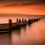 Sunset Reflection on Still Waters by Jan Murphy -  