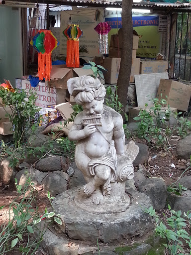 Statue Playing Music Instrument