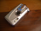 A small duct tape roll will stop the shutter button from being pressed against the case from centrifugal force