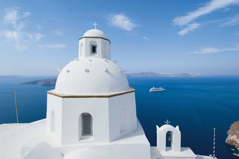   Seven Seas Voyager sails through the flooded caldera that rings the glamorous island of Santorini.