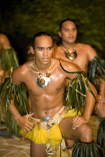 Male-Tane-Dancers - Tane dancers perform on Moorea, typically to the themes of warfare or sailing, and they often use spears or paddles.