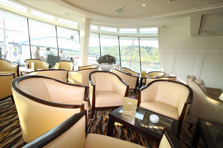 Relax in AmaLyra's spacious Panoramic Lounge and watch the passing vistas on your luxury river cruise of Europe.