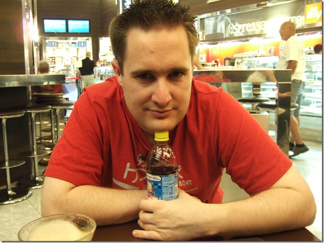 The Diet Pepsi bottle is the only thing holding Nick's head up.  Jet lag returns in the coffee shop in the Venetian.