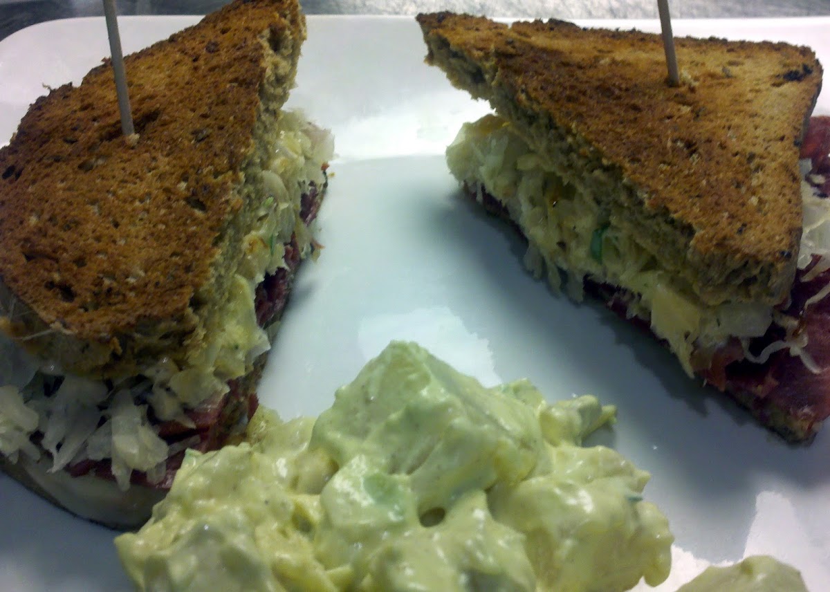 New Reuben Sandwich with natural corned beef and house made Thousand Island Dressing on mock rye bre