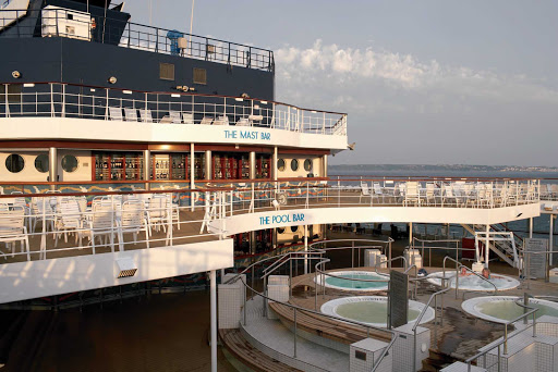 Savor the moments in the whirlpools on Celebrity Century's pool deck.