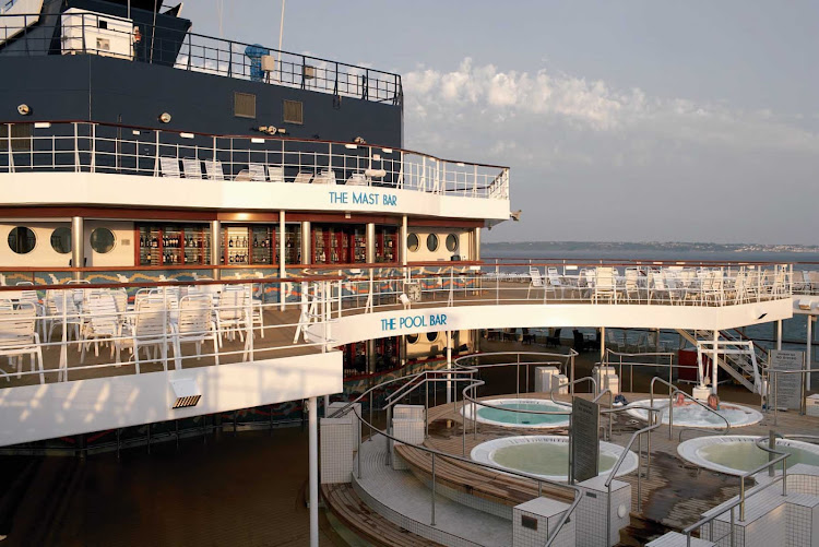 Savor the moments in the whirlpools on Celebrity Century's pool deck.