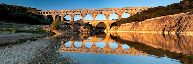 Plan a day trip to Pont du Gard, an ancient Roman aqueduct bridge in southern France, on your next Mediterranean cruise.