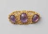 Broche van goud en amethist