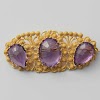 Broche van goud en amethist