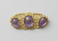 Broche van goud en amethist