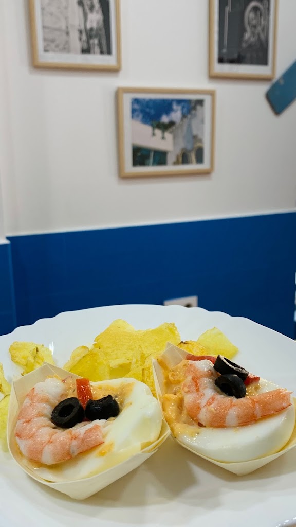 Taberna La Proa — Comida y bebida