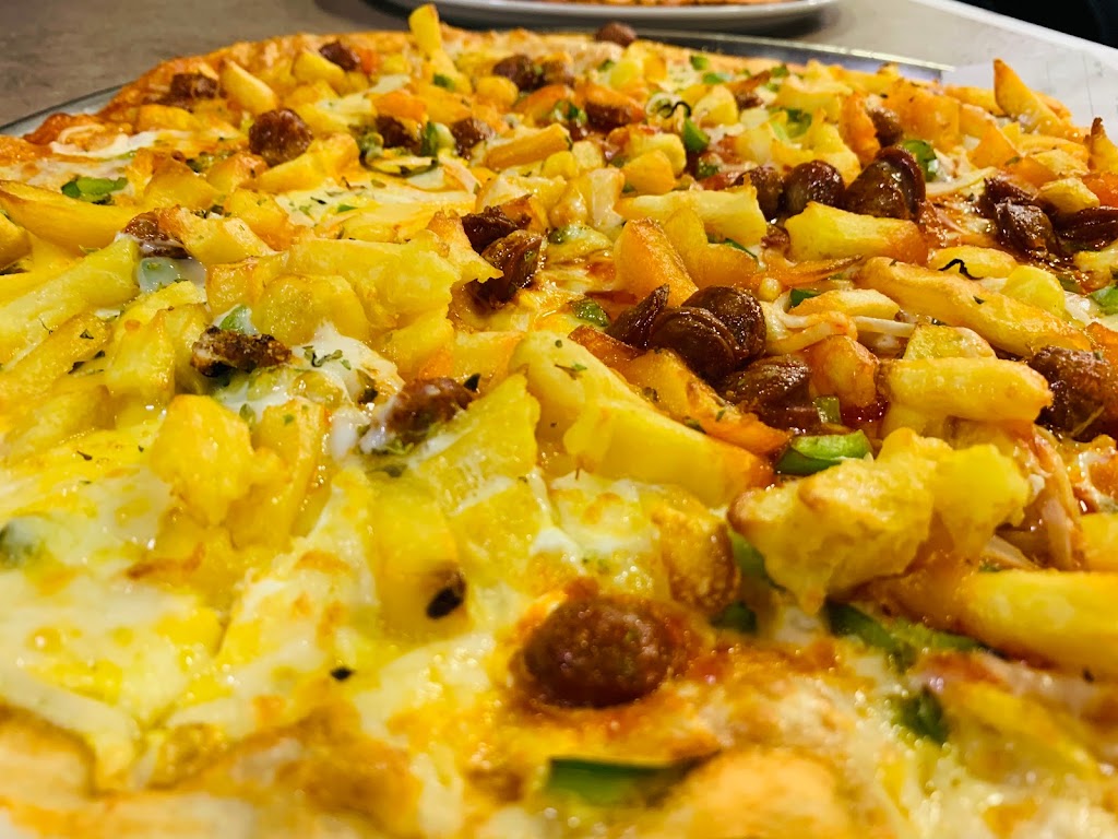 Pizzeria Nonetto — Comida y bebida