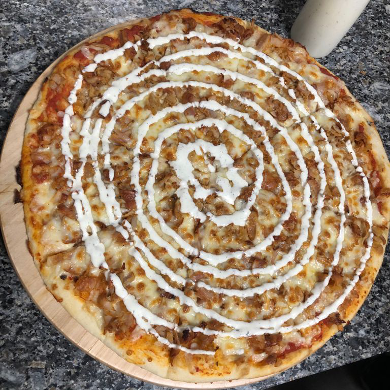 Al Medina Kebab, pizzeria y pollo asado — Comida y bebida