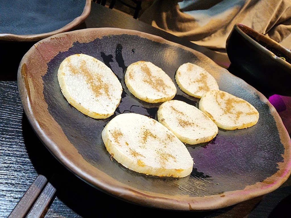 賣烤魚的。 的照片