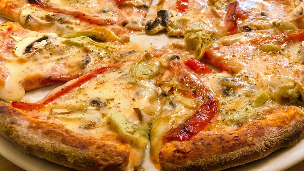 Pizzeria Michele — Comida y bebida