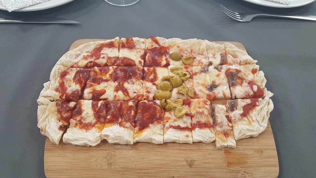Restaurante Urimare. Parrillada Pizzeria — Comida y bebida