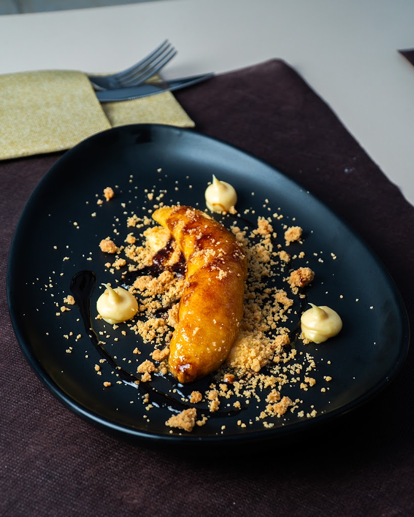 Emblematica Rooftop — Comida y bebida
