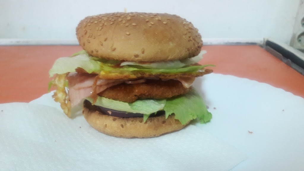 El Tirador kebab Pizzeria — Comida y bebida