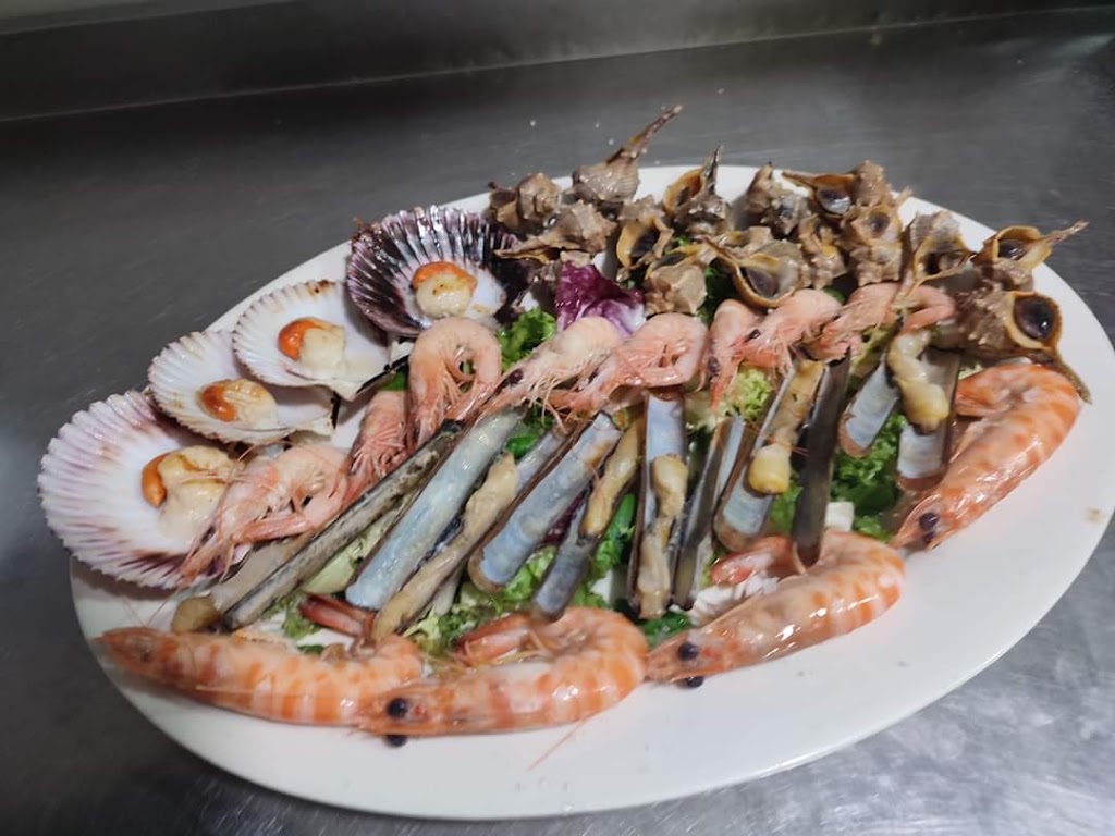 Taberna Descalzas — Comida y bebida