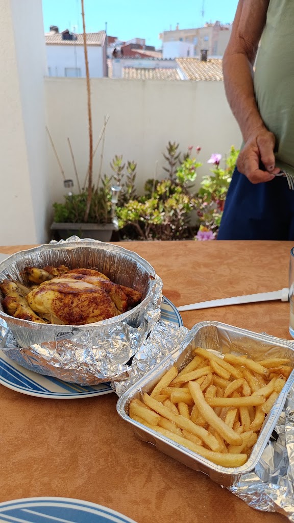 Rosticeria Sant Feliu — Comida y bebida