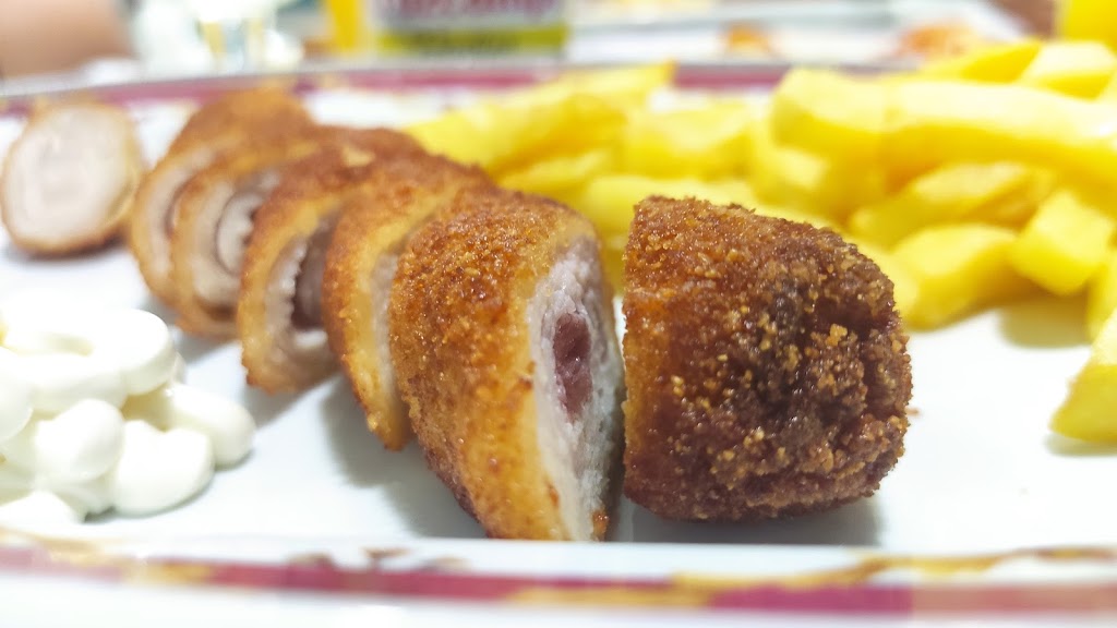 El Postigo de la Pianola — Comida y bebida
