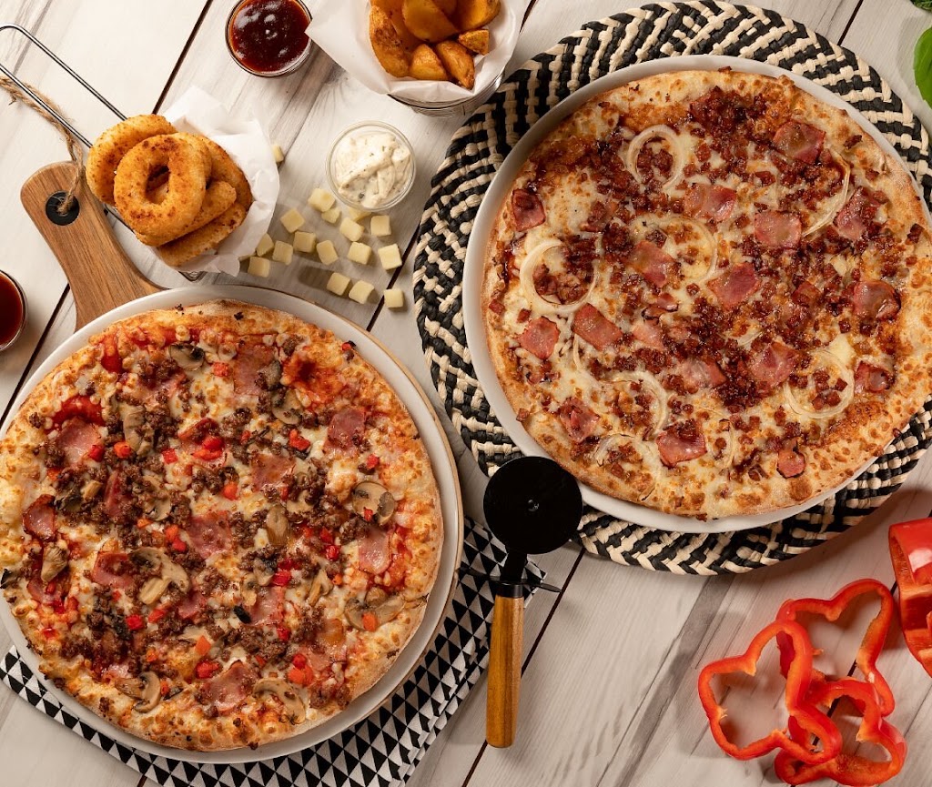 Pizzerias Carlos — Comida y bebida