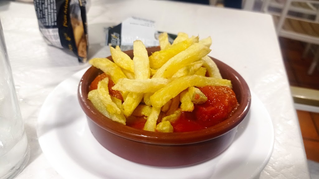 Cerveceria Casa Paquito — Comida y bebida