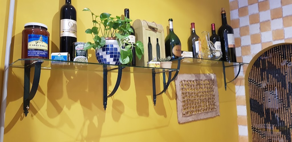 Taberna El Vid — Comida y bebida