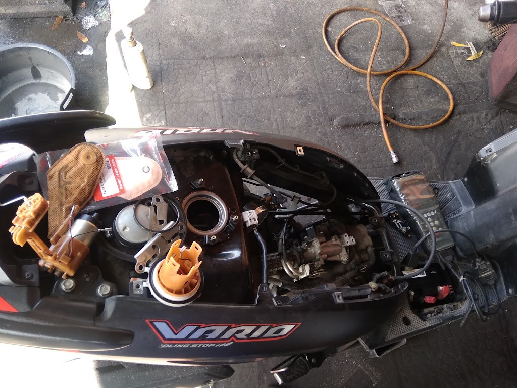 Agus bengkel motor metic
