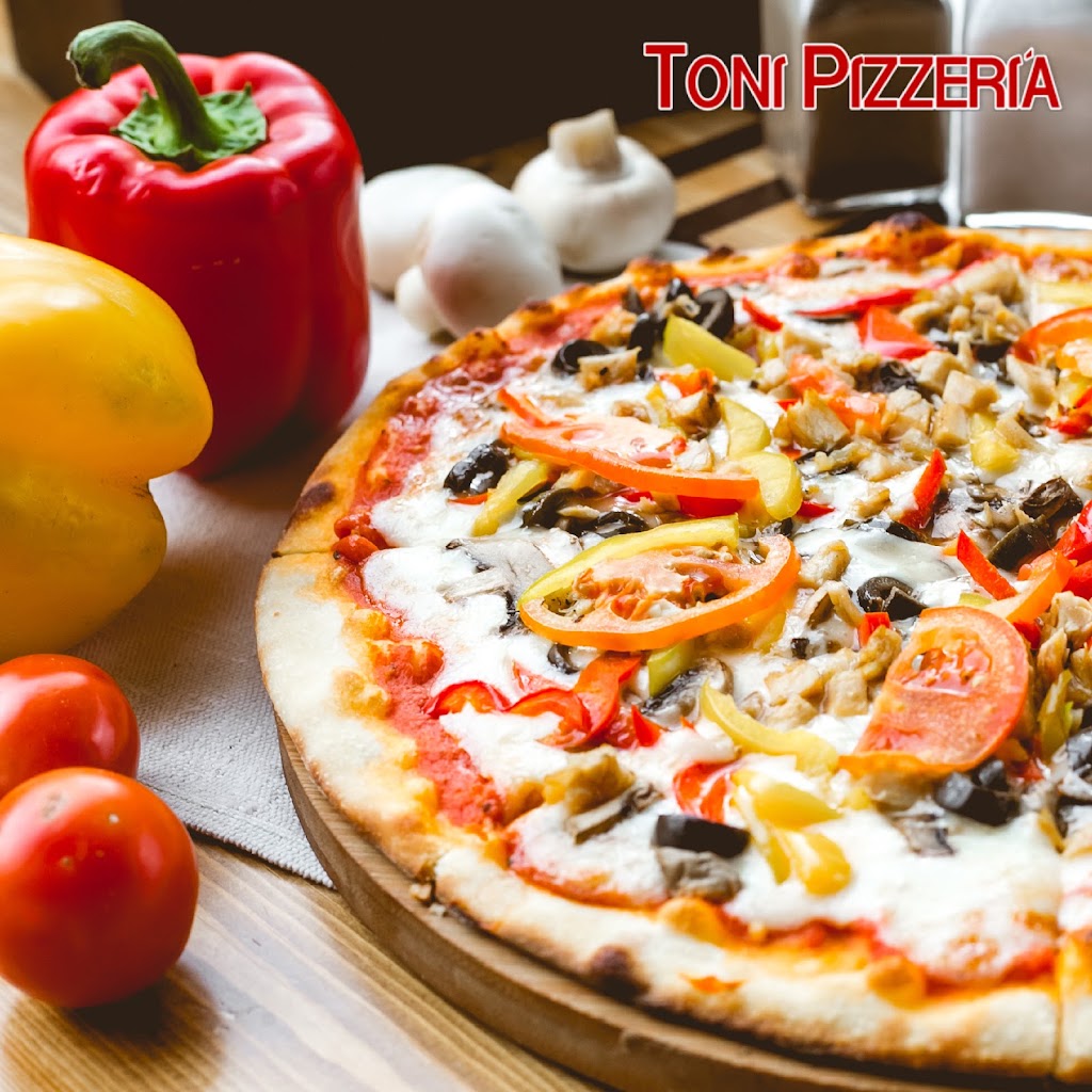 Toni pizzeria Quart de poblet — Comida y bebida
