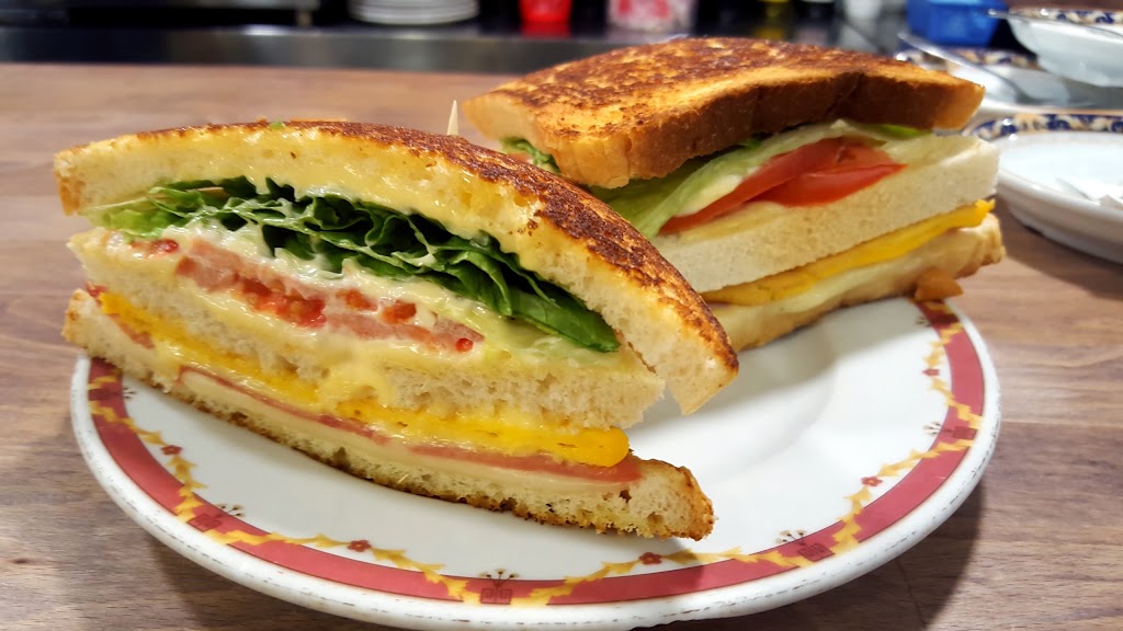 La Porticada Cafe Bar — Comida y bebida