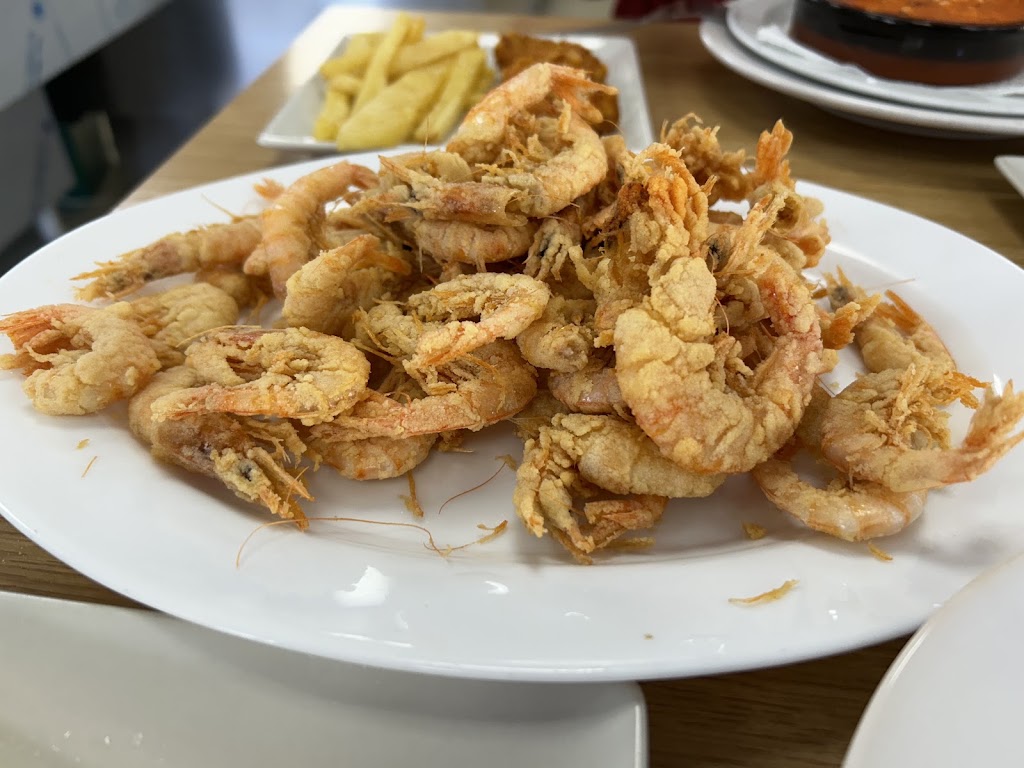 Restaurante Dos Caridad — Comida y bebida