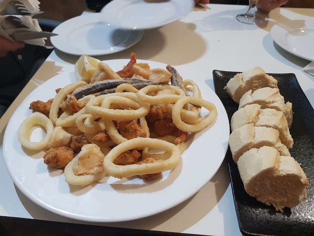 Cafe-Bar Nuevo Manzanares. — Comida y bebida