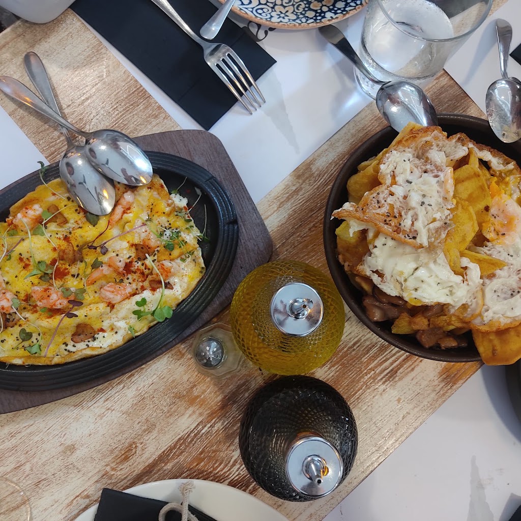 Timonel Marbella — Comida y bebida