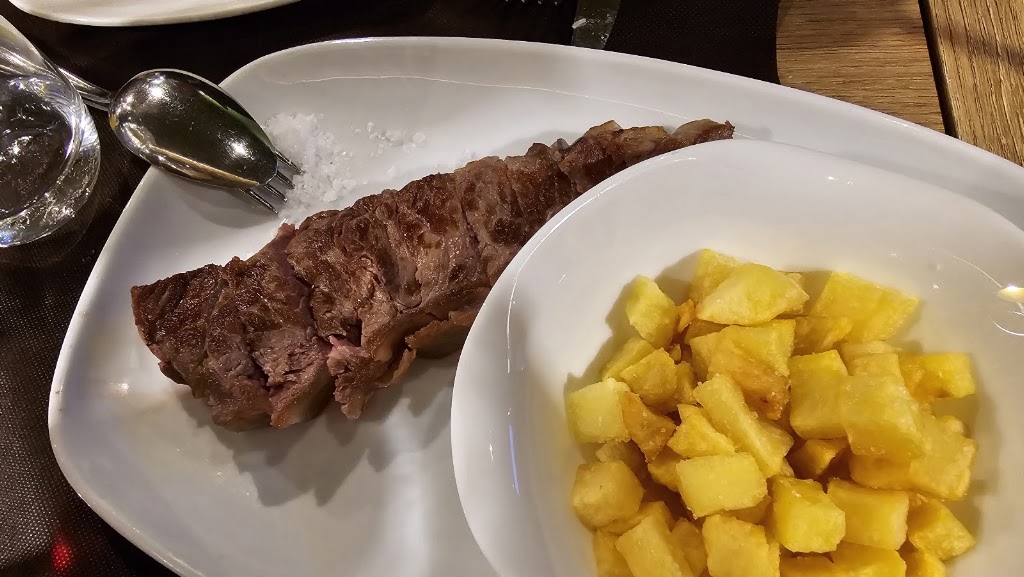 Los Caracoles Restaurante — Comida y bebida