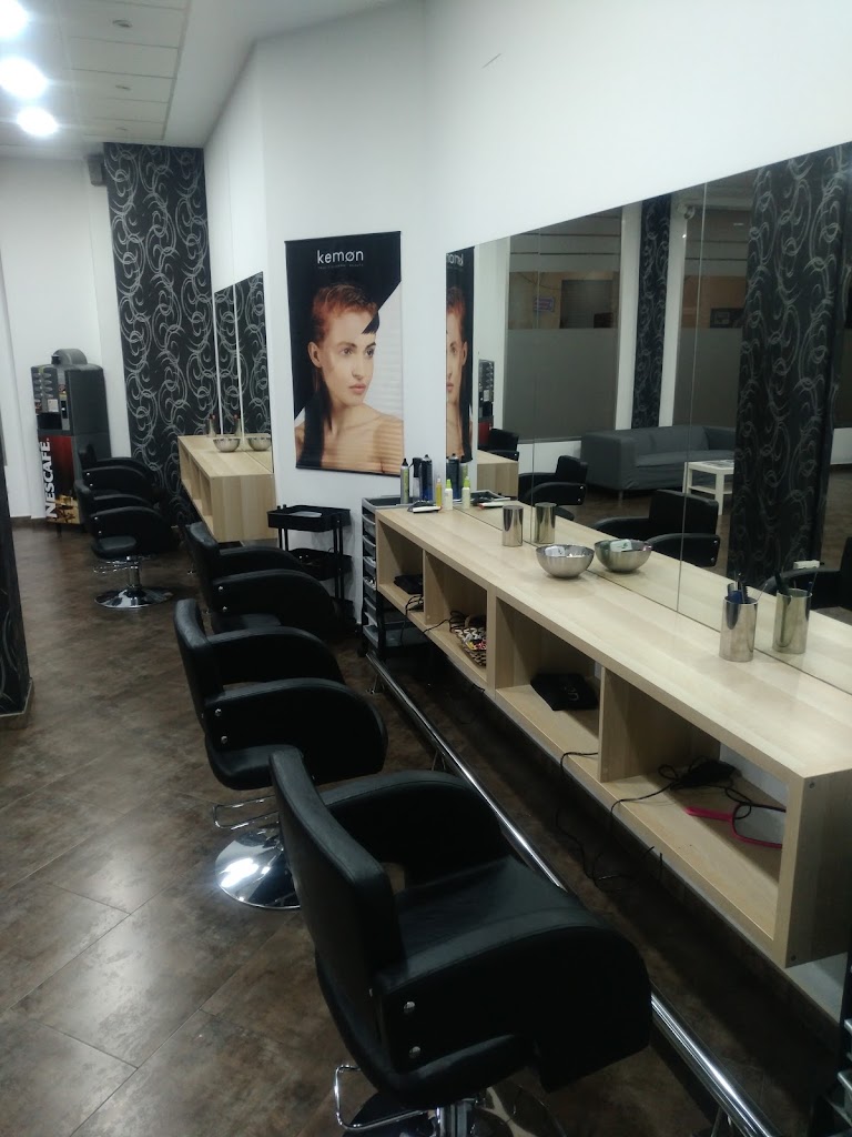 CRISTINA MONDEJAR Peluqueria Unisex. — Interior
