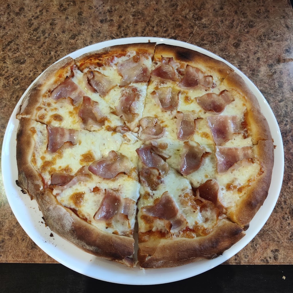 Pizza Wimp — Comida y bebida